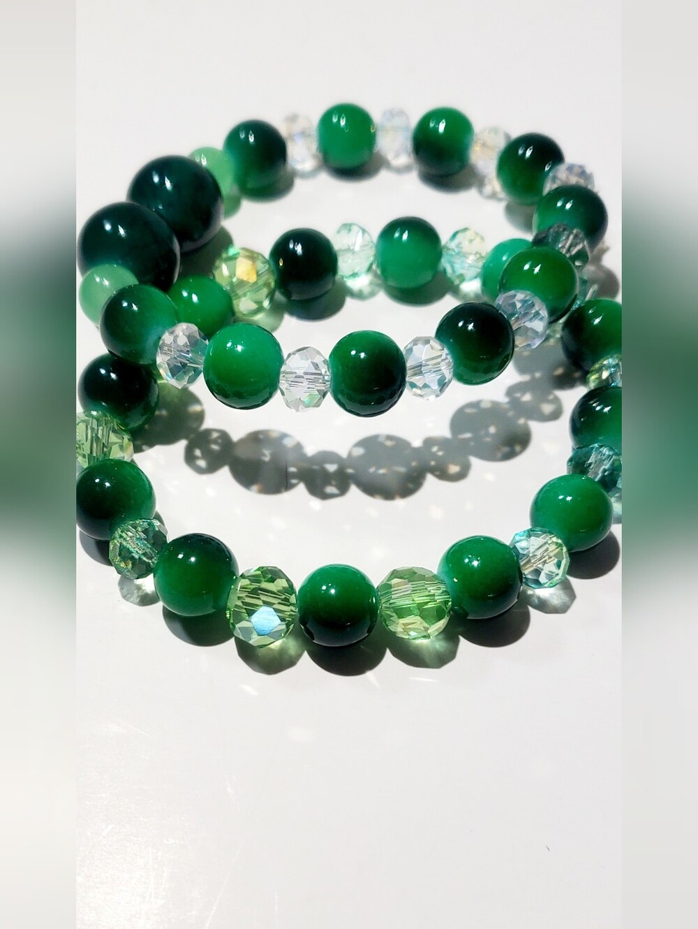 Green Beaded Stretch Bracelet - Elegantly Faceted Green Glass Beads